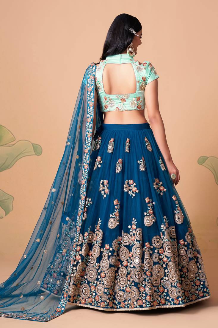 Dove Blue Thread Zari Dori And Sequins Embroidered With Mirror Work Soft Net Lehenga Choli