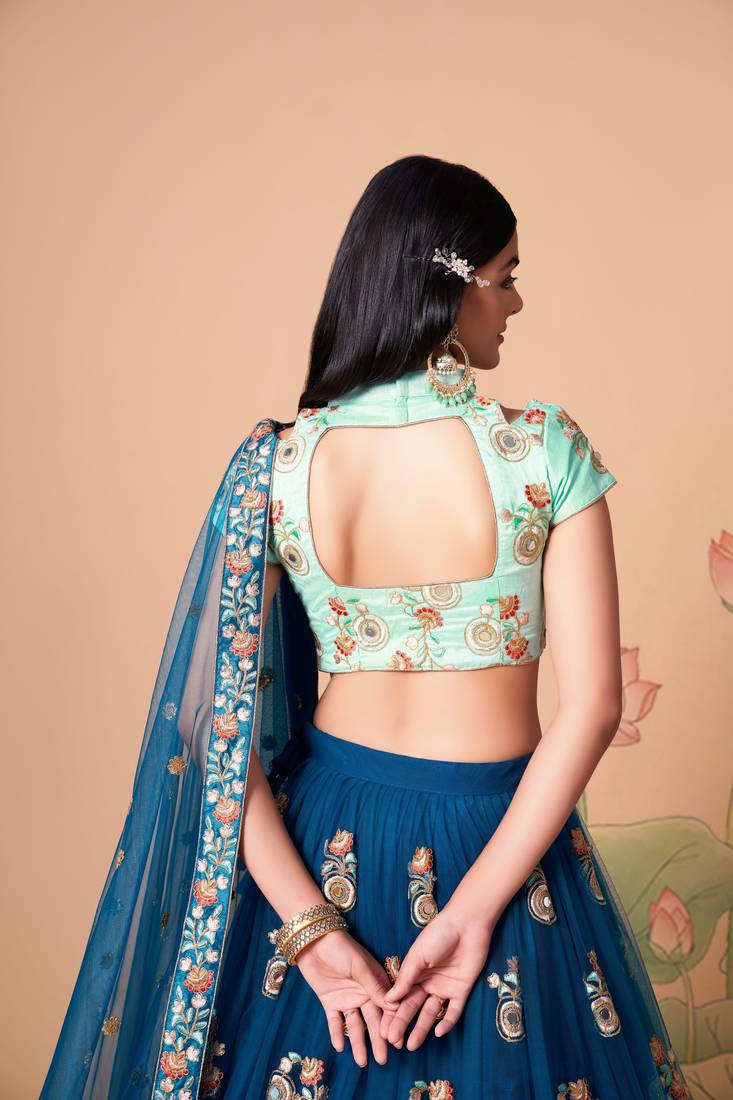 Dove Blue Thread Zari Dori And Sequins Embroidered With Mirror Work Soft Net Lehenga Choli