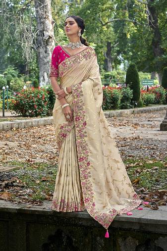 Cream Colour Faux Banarasi Silk Embroidered Woven Saree With Blouse