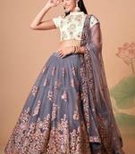 Grey Thread Zari Dori And Sequins Embroidered With Mirror Work Soft Net Lehenga Choli