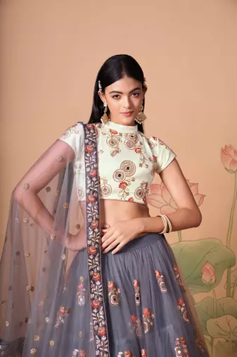 Grey Thread Zari Dori And Sequins Embroidered With Mirror Work Soft Net Lehenga Choli