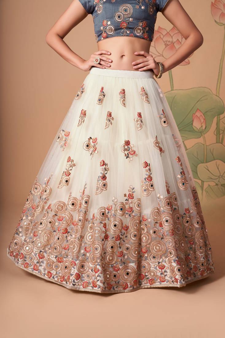 Off White Thread Zari Dori And Sequins Embroidered With Mirror Work Soft Net Designer Lehenga Choli