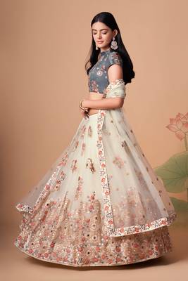 Off White Thread Zari Dori And Sequins Embroidered With Mirror Work Soft Net Designer Lehenga Choli 4