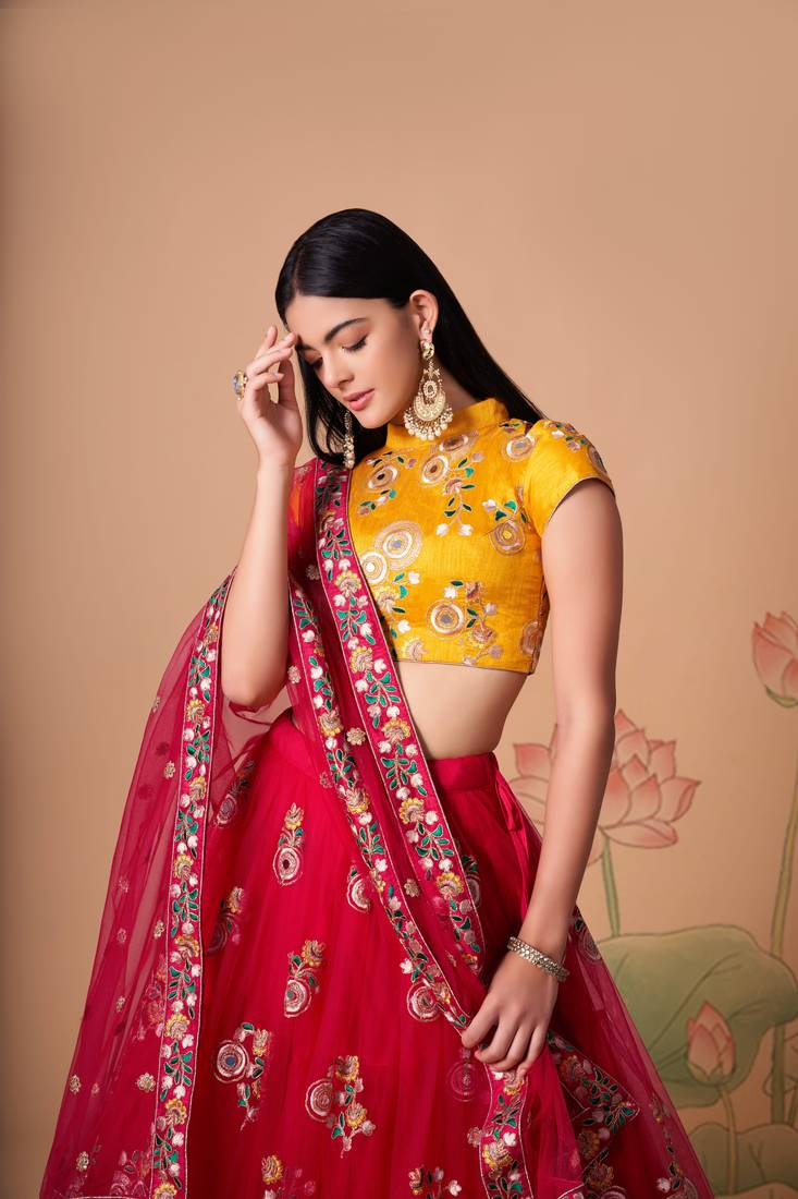  Rani Thread Zari Dori And Sequins Embroidered With Mirror Work Soft Net Lehenga Choli And Dupatta