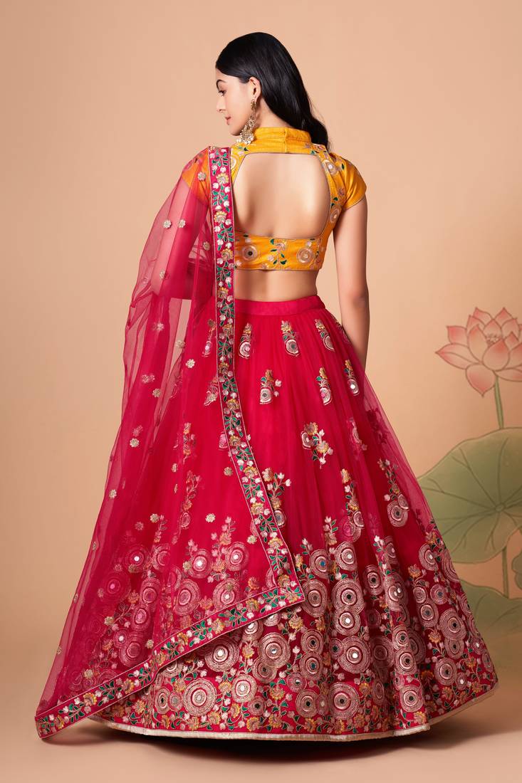  Rani Thread Zari Dori And Sequins Embroidered With Mirror Work Soft Net Lehenga Choli And Dupatta