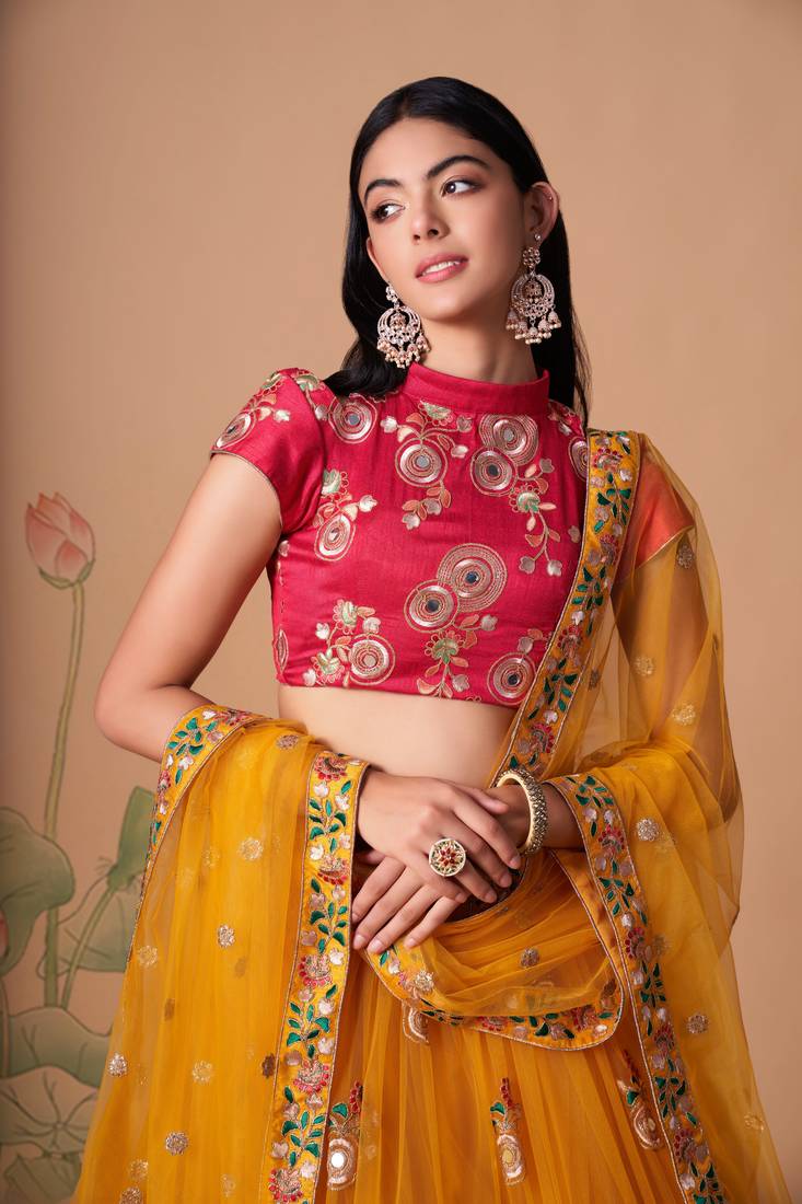  Yellow Thread Zari Dori And Sequins Embroidered With Mirror Work Soft Net Lehenga Choli For Party