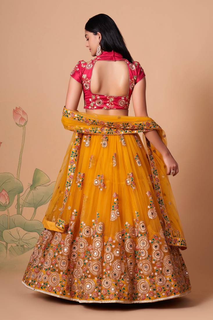  Yellow Thread Zari Dori And Sequins Embroidered With Mirror Work Soft Net Lehenga Choli For Party