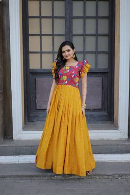 Smartly printed yellow colour muslin and chinon fabric partywear girlish gown 1