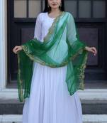 Fancy and stylish white gown with green colour embroidered dupatta