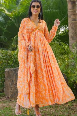 Smart and elegant orange colour gown with dupatta for trendy looks 1