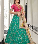 Fetching Green Thread Zari Dori And Sequins Embroidered Art Silk Lehenga And Pink Choli