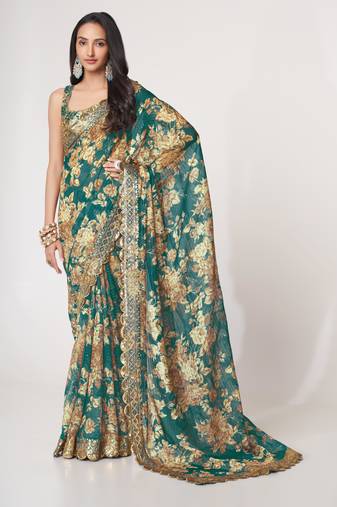 Deep Teal green features antique gold floral prints and Richly covered with gold sequin embroidered saree