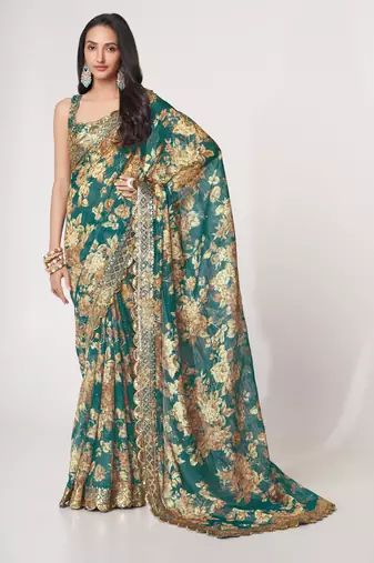 Deep Teal green features antique gold floral prints and Richly covered with gold sequin embroidered saree
