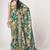 Deep Teal green features antique gold floral prints and Richly covered with gold sequin embroidered saree
