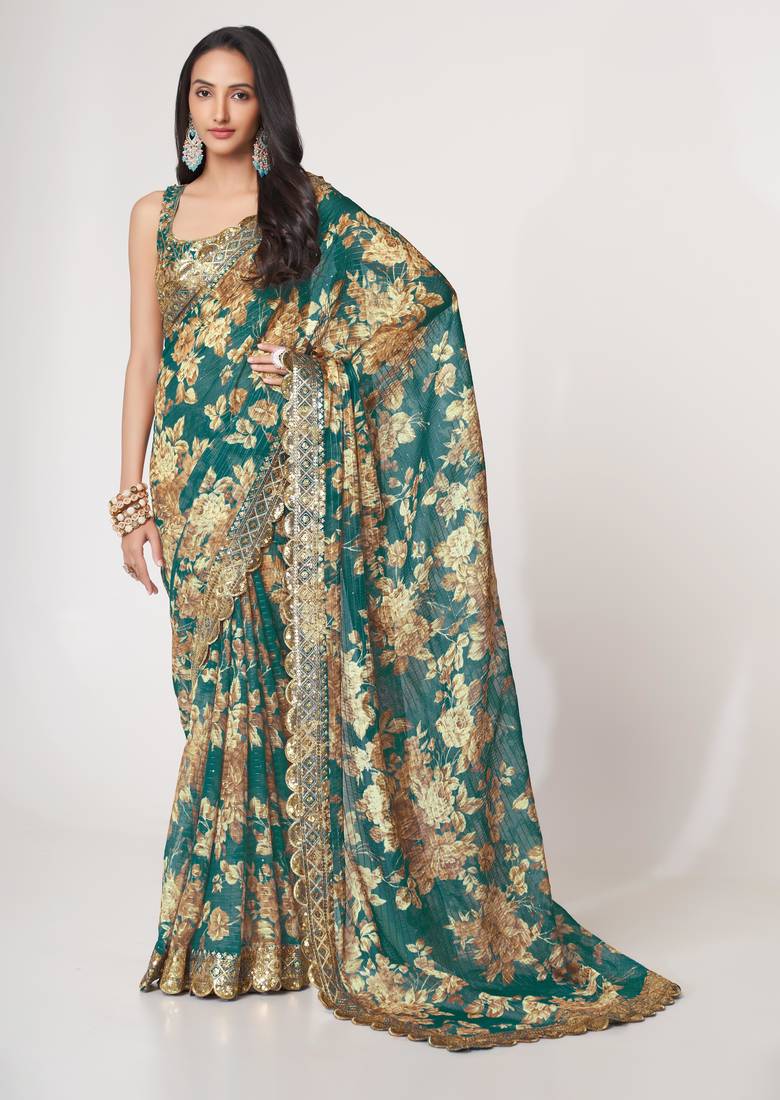 Deep Teal green features antique gold floral prints and Richly covered with gold sequin embroidered saree