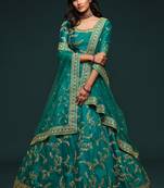 Marvelous Green Colored Thread Zari Dori And Sequins Embroidered Art Silk Designer Lehenga For Wedding Occasion
