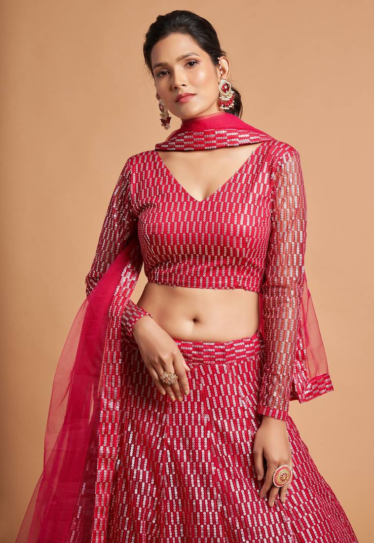 Provocative Hot Pink Thread And Multiple Sequins Embroidered Soft Net Lehenga Choli For Bride
