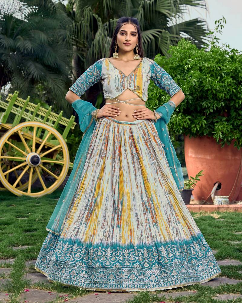 TURQUOISE & MULTICOLOR ZARI & SEQUINS EMBROIDERED WITH DIGITAL PRINT CHINON FABRIC PARTY WEAR SEMI STITCHED CHOLI