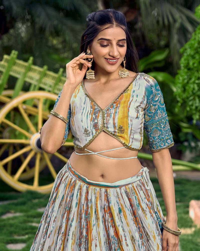 TURQUOISE & MULTICOLOR ZARI & SEQUINS EMBROIDERED WITH DIGITAL PRINT CHINON FABRIC PARTY WEAR SEMI STITCHED CHOLI