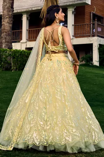 YELLOW THREAD & SEQUINS EMBROIDERED WITH NET FABRIC DESIGNER WEDDING PARTY WEAR FESTIVAL SEMI STITCHED LEHENGA CHOLI
