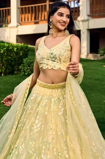 YELLOW THREAD & SEQUINS EMBROIDERED WITH NET FABRIC DESIGNER WEDDING PARTY WEAR FESTIVAL SEMI STITCHED LEHENGA CHOLI