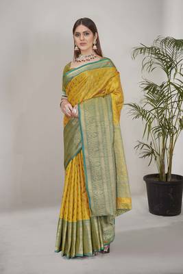 Yellow kanchipuram pattu silk traditional contrast zari woven saree 1