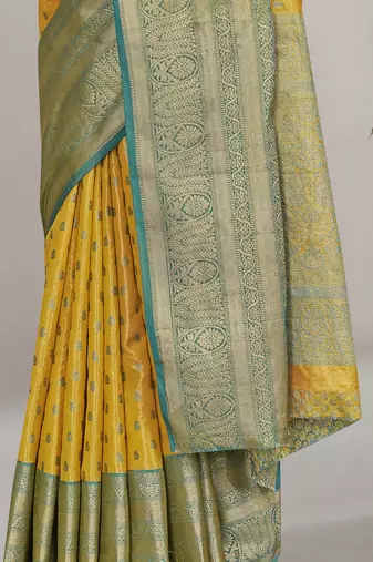 Yellow kanchipuram pattu silk traditional contrast zari woven saree