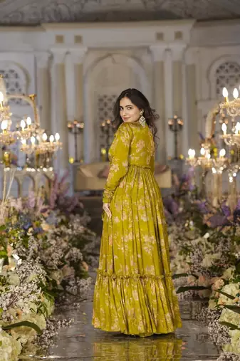 Smart and classy green colour crop top dress with sharara and shrug for party looks