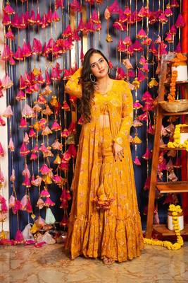 Smart and classy yellow colour crop top dress with sharara and shrug for party looks 1