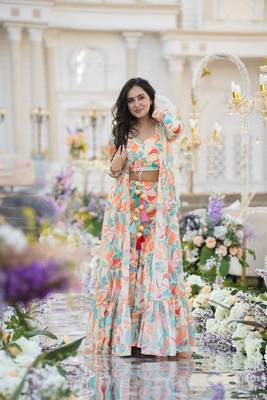 Smart and classy white colour crop top dress with sharara and shrug for party looks 1