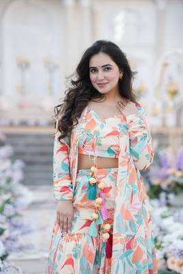 Smart and classy white colour crop top dress with sharara and shrug for party looks 3