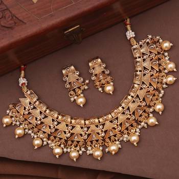 Antique pearl drop necklace set for festive occasions, embellished with stones 1