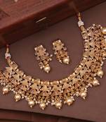 Antique pearl drop necklace set for festive occasions, embellished with stones