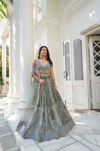 Green Heavy Embroidery Net Semi Stitch A Line Lehenga With Blouse