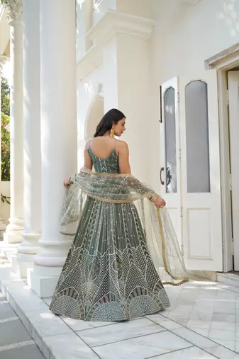 Green Heavy Embroidery Net Semi Stitch A Line Lehenga With Blouse