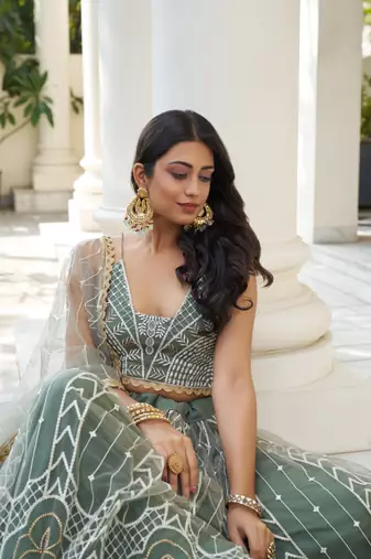 Green Heavy Embroidery Net Semi Stitch A Line Lehenga With Blouse