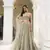Ivory Heavy Embroidery Net Semi Stitch A Line Lehenga With Blouse