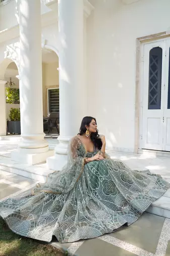 GLAMOROUS DUSTY GREEN BUTTERFLY NET WITH THREAD AND SEQUENCE EMBROIDERED WORK FANCY LACE LEHENGA CHOLI FOR WEDDING