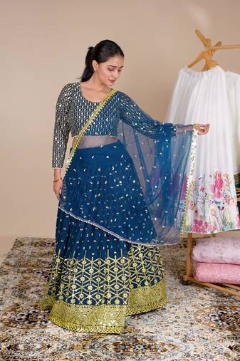 Beautiful Blue Embroidered Lehenga Choli With Net Dupatta 