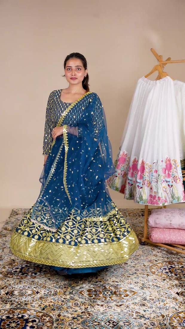 Beautiful Blue Embroidered Lehenga Choli With Net Dupatta 