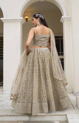 IVORY NET FABRIC LEHENGA CHOLI WITH SEQUINS AND THREAD EMBROIDERY WORK 3