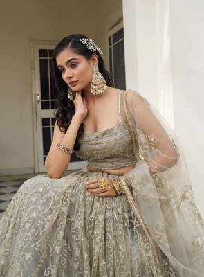 IVORY NET FABRIC LEHENGA CHOLI WITH SEQUINS AND THREAD EMBROIDERY WORK 4