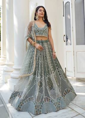 GREEN NET FABRIC LEHENGA CHOLI WITH SEQUINS AND THREAD EMBROIDERY WORK 1