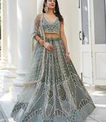 GREEN NET FABRIC LEHENGA CHOLI WITH SEQUINS AND THREAD EMBROIDERY WORK