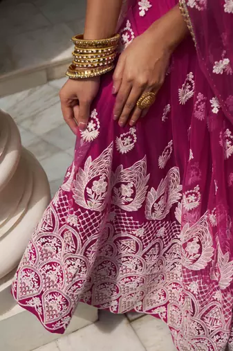 DARK PINK NET FABRIC LEHENGA CHOLI WITH SEQUINS AND THREAD EMBROIDERY WORK