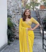 Riya sadi yellow heavy sequence embroidery faux georgette saree with blouse