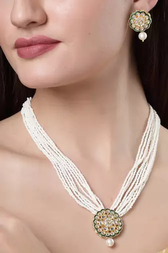 Women white & gold-plated kundan & pearl jewellery set