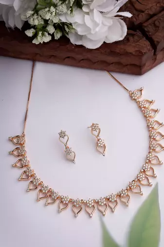 Women gold-plated american diamond-studded handcrafted jewellery set