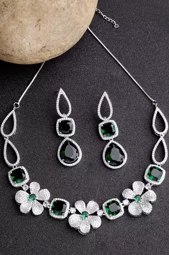 Women green & silver-plated american diamond handcrafted jewellery set