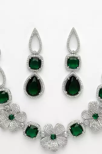 Women green & silver-plated american diamond handcrafted jewellery set